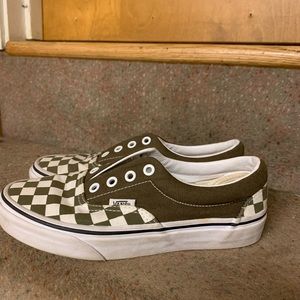 Dark green authentic vans. Size women’s 6. Worn a couple times.